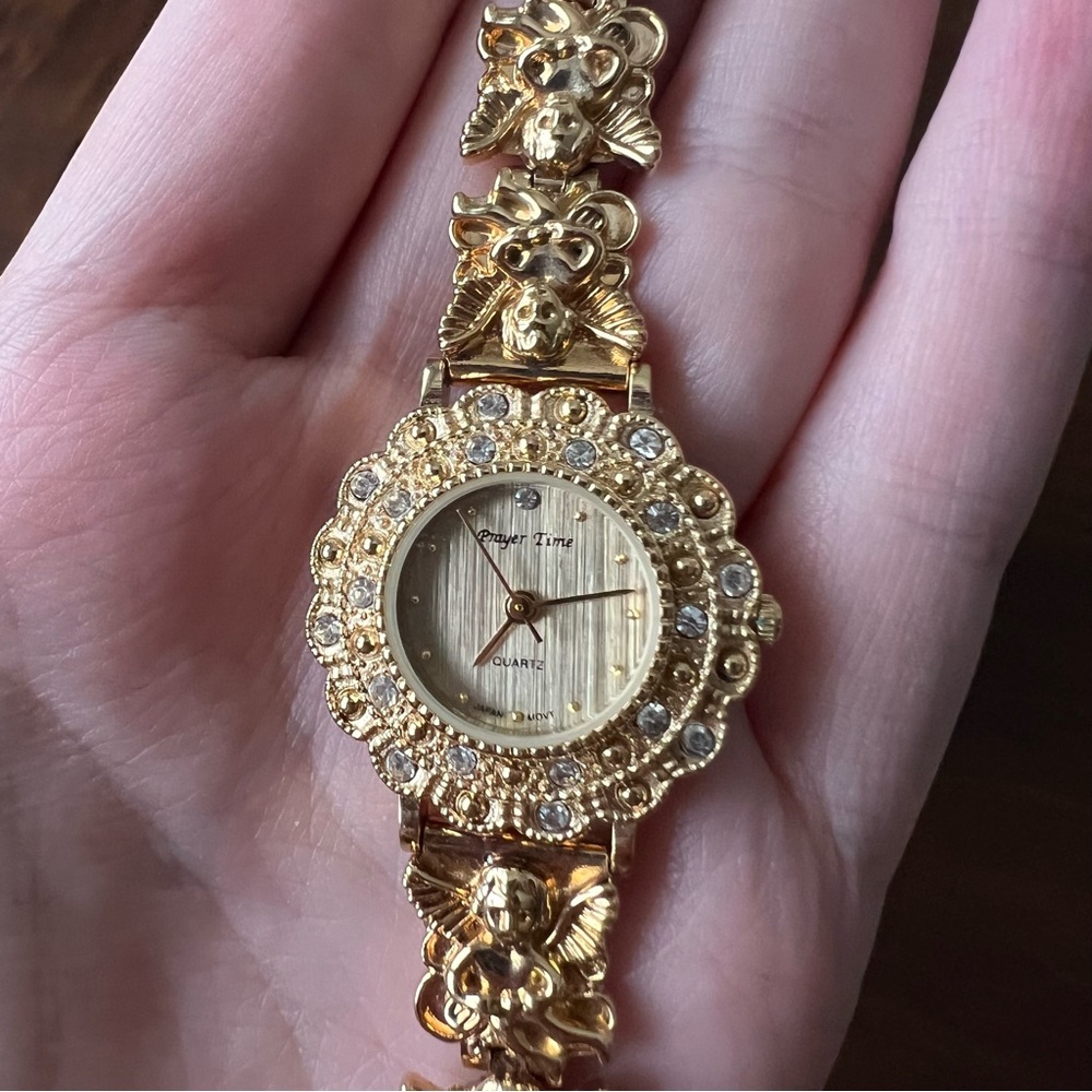 Prayer Time Women’s Quartz Dress Watch Gold Tone Angel Bracelet Analog